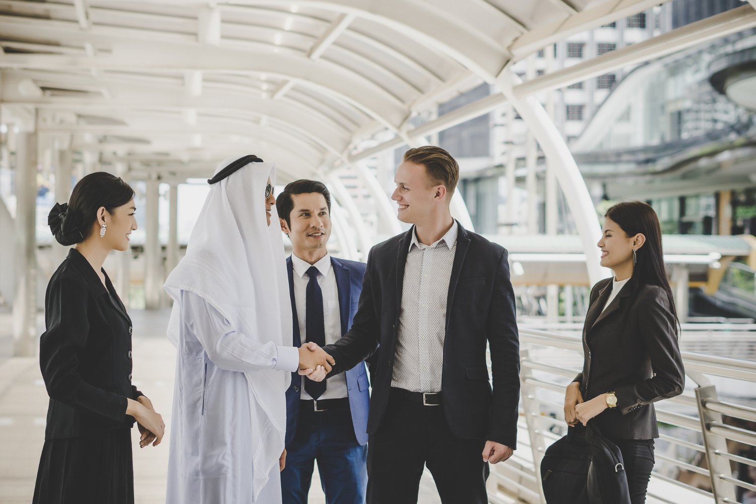 a group of people shaking hands